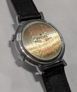 Orologio Svegliarino Vremia meccanico manuale - Grade A 18 a close up of a watch