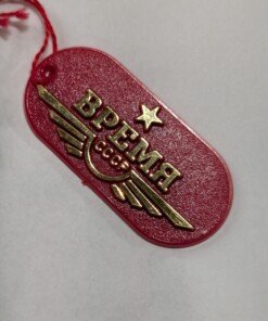 Orologio Svegliarino Vremia meccanico manuale - Grade A 16 a red tag with gold text