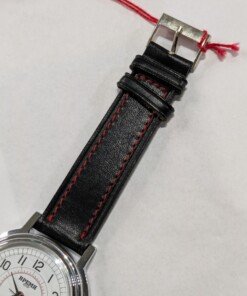 Orologio Svegliarino Vremia meccanico manuale - Grade A 14 a watch with a leather strap