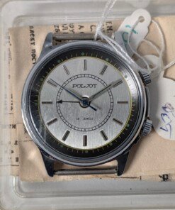Orologio svegliarino meccanico Poljot 2612.1 NOS con quadrante argentato, indici applicati, doppia corona e il suo passaporto originale.