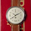 Orologio Raketa RAKY con quadrante bianco e lettere cirilliche decorative, movimento Raketa anni '90