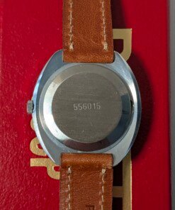 Orologio Raketa RAKY con quadrante bianco e lettere cirilliche decorative, movimento Raketa anni '90