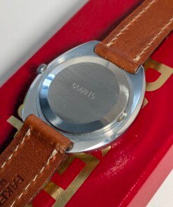 Orologio Raketa RAKY con quadrante bianco e lettere cirilliche decorative, movimento Raketa anni '90