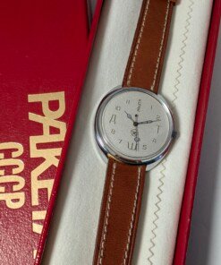 Orologio Raketa RAKY con quadrante bianco e lettere cirilliche decorative, movimento Raketa anni '90
