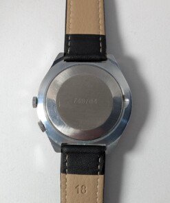Raketa 24h Polar - Cassa cromata - Quadrante argento - Grade B 13 Orologio Raketa 24 ore Polar con quadrante argento e scala colorata in rosso e blu, movimento meccanico sovietico