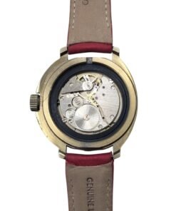 Orologio russo vintage da collezione con movimento meccanico a vista, cassa dorata e cinturino in vera pelle rosso.