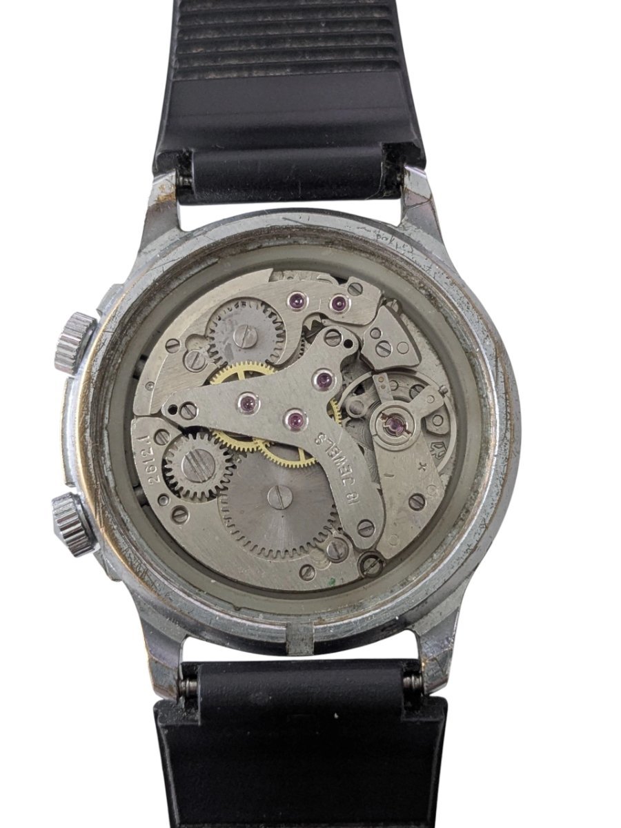 Orologio Poljot Alarm Calibro 2612.1 Anni 2000 Russia 5 Orologio sovietico vintage: vista ravvicinata del calibro Poljot 2612.1 a 18 rubini con meccanismo di allarme. Autentico orologio russo da collezione.