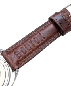 Orologio vintage russo Vostok con cinturino in pelle marrone goffrato "BOCTOK", fondello in acciaio.