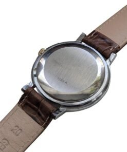 Radius Automatico Vintage Cassa Bicolore Calibro Slava 2427 – Grade B 12 Retro destro di orologio vintage russo da collezione con fondello a vite in metallo spazzolato, numero 1583 A e cinturino in pelle marrone 20mm.